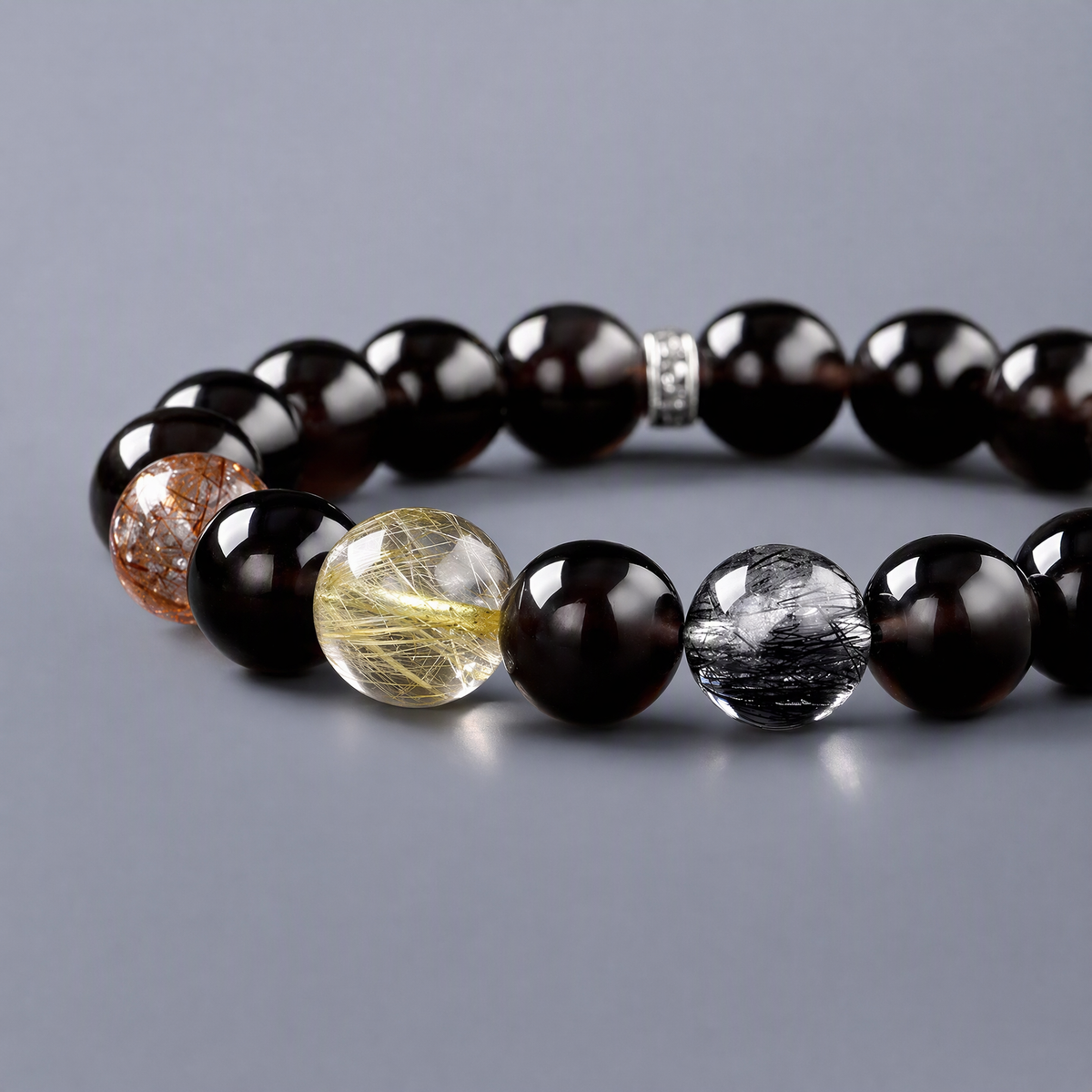 Black Obsidian & Rutilated Quartz Bracelet – Black, Gold & Silver Tones